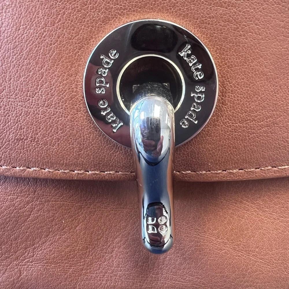 Kate Spade leather clutch with strap